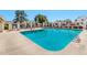 Enjoy community pool with ample space for swimming and relaxing on a sunny day at 2455 E Broadway Rd # 13, Mesa, AZ 85204
