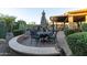 The patio area features ample seating and desert landscaping at 27654 N 125Th Dr, Peoria, AZ 85383