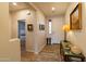 Bright foyer with neutral walls, tile flooring, and decorative furnishings creating a welcoming entrance at 27654 N 125Th Dr, Peoria, AZ 85383