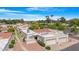 Aerial view of residences showcasing well-manicured landscaping, ample parking, and vibrant green trees at 2844 W Christy Dr, Phoenix, AZ 85029