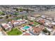 An aerial view of homes with community pool and well-maintained lawns in a vibrant neighborhood at 2844 W Christy Dr, Phoenix, AZ 85029