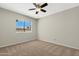 Bedroom with carpet and window with horizontal blinds at 2844 W Christy Dr, Phoenix, AZ 85029