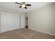 Bedroom with closet and view to hallway at 2844 W Christy Dr, Phoenix, AZ 85029