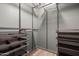 Walk-in closet with shelving and storage baskets at 2844 W Christy Dr, Phoenix, AZ 85029