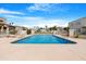 Inviting community pool with lounge chairs, clear blue water and ample deck space for relaxation and enjoyment at 2844 W Christy Dr, Phoenix, AZ 85029