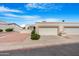 Inviting single-story home with xeriscaping, two-car garage, and charming architectural details, set in a tranquil neighborhood at 2844 W Christy Dr, Phoenix, AZ 85029