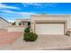 Charming home featuring low-maintenance landscaping and a two-car garage on a sunny day, creating a welcoming curb appeal at 2844 W Christy Dr, Phoenix, AZ 85029
