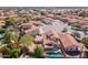 Aerial view of the home with pool and well-manicured landscaping at 2916 E Amber Ridge Way, Phoenix, AZ 85048
