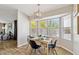 Inviting dining area filled with natural light from a large bay window at 2916 E Amber Ridge Way, Phoenix, AZ 85048