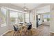 Bright dining area with a bay window and neutral paint at 2916 E Amber Ridge Way, Phoenix, AZ 85048