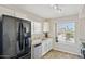 Charming kitchen featuring stainless steel appliances, granite counters, and ample storage at 2916 E Amber Ridge Way, Phoenix, AZ 85048
