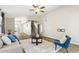 Open concept living room with wood floors and vaulted ceilings at 2916 E Amber Ridge Way, Phoenix, AZ 85048