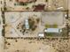 Aerial view of property with home, riding arena, metal building, and ample space for horses at 29204 N Bryce Trl, Queen Creek, AZ 85144