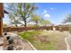 Wide backyard view with established landscaping and lush green grass at 29204 N Bryce Trl, Queen Creek, AZ 85144