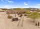 Southwestern home boasts beautiful desert landscaping, a stucco exterior, and mountain views at 29204 N Bryce Trl, Queen Creek, AZ 85144