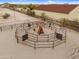 Aerial view of a multi-horse exerciser with metal fencing, offering a practical solution for equestrian training needs at 29204 N Bryce Trl, Queen Creek, AZ 85144