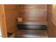 The community sauna has wooden benches and a bucket for the ultimate relaxation experience at 2929 W Yorkshire Dr # 2118, Phoenix, AZ 85027