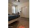 Bedroom features a large window and a closet with sliding doors at 29908 W Monterey Dr, Buckeye, AZ 85396