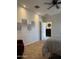 The bedroom features recessed lighting, soft carpet, and an open bathroom at 29908 W Monterey Dr, Buckeye, AZ 85396