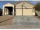 Charming single-story home with a two-car garage and covered front porch at 29908 W Monterey Dr, Buckeye, AZ 85396