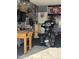 The garage features a motorcycle, foosball table and tv at 29908 W Monterey Dr, Buckeye, AZ 85396