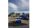 Fun playground area with slides, swings, and a blue hippo structure for children to enjoy in a safe environment at 29908 W Monterey Dr, Buckeye, AZ 85396