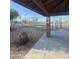View of the tennis court from the covered seating area at 29908 W Monterey Dr, Buckeye, AZ 85396