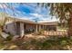 Home exterior with a covered porch and spacious backyard at 3137 W Baseline Rd, Laveen, AZ 85339