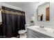 Bathroom featuring white walls, new toilet, new shower curtain and updated vanity at 3137 W Baseline Rd, Laveen, AZ 85339