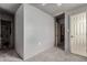 Bedroom with neutral walls, ceiling fan and door to bathroom at 3137 W Baseline Rd, Laveen, AZ 85339