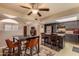 A lovely kitchen with a breakfast bar and adjacent dining area at 3137 W Baseline Rd, Laveen, AZ 85339