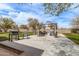 Relaxing backyard patio area, featuring a grill and comfortable seating for outdoor gatherings at 3137 W Baseline Rd, Laveen, AZ 85339