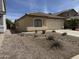 Charming single-story home with a well-maintained xeriscaped front yard and a two-car garage at 37959 N Luke Ln, San Tan Valley, AZ 85140