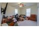 Spacious bedroom is cluttered with belongings, showing its size and potential at 40314 W Marion May Ln, Maricopa, AZ 85138