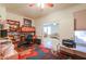 Comfortable home office space with built-in shelving offering functionality and style at 40314 W Marion May Ln, Maricopa, AZ 85138