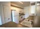 Well-lit kitchen with white appliances, cabinets, and a double-basin sink at 435 W Rio Salado Pkwy # 210, Tempe, AZ 85281