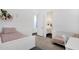 Cozy bedroom with two beds, a bathroom, and neutral tones for a relaxing and comfortable space at 4457 E Fountain St, Mesa, AZ 85205