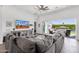 Spacious living room with large sliding doors leading to the outdoor patio and pool area at 4457 E Fountain St, Mesa, AZ 85205