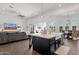 Open concept living space features a large kitchen island and a comfortable living room at 4457 E Fountain St, Mesa, AZ 85205