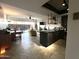 Open-concept living area includes a stylish kitchen and comfortable seating at 4750 N Central Ave # 1N, Phoenix, AZ 85012