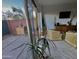 Bright living room offers a view of the patio and outdoor area at 4750 N Central Ave # 1N, Phoenix, AZ 85012
