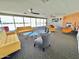 Bright lounge area with expansive windows, modern furnishings, and a sleek fireplace feature at 4750 N Central Ave # 1N, Phoenix, AZ 85012