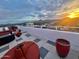 Stylish rooftop patio offering stunning views, featuring comfortable seating and decorative planters at 4750 N Central Ave # 1N, Phoenix, AZ 85012