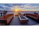Relaxing rooftop seating area with a fire pit, perfect for enjoying sunsets and city views at 4750 N Central Ave # 1N, Phoenix, AZ 85012