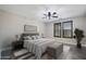 Serene main bedroom featuring natural light and a neutral color palette to create a relaxing space at 5100 E Rancho Paloma E Dr # 1046, Cave Creek, AZ 85331