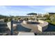 Community area featuring a shaded fire pit with seating and desert landscaping at 5100 E Rancho Paloma E Dr # 1046, Cave Creek, AZ 85331