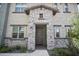 Inviting front door with stone accents, covered entryway and the house number clearly displayed at 5100 E Rancho Paloma E Dr # 1046, Cave Creek, AZ 85331