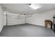 Spacious two car garage with white walls and sealed concrete flooring at 5100 E Rancho Paloma E Dr # 1046, Cave Creek, AZ 85331