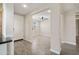 Wide hallway and entryway with wood-look flooring and neutral wall color at 5100 E Rancho Paloma E Dr # 1046, Cave Creek, AZ 85331