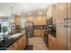 Spacious kitchen with granite countertops, stainless appliances, and ample cabinet storage at 5100 E Rancho Paloma E Dr # 1046, Cave Creek, AZ 85331